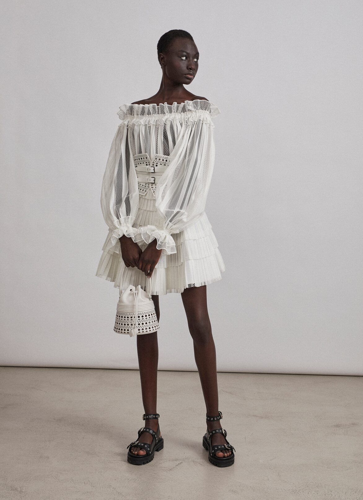 Flared lace skirt
 ALAÏA WHITE FLARED LACE SKIRT
